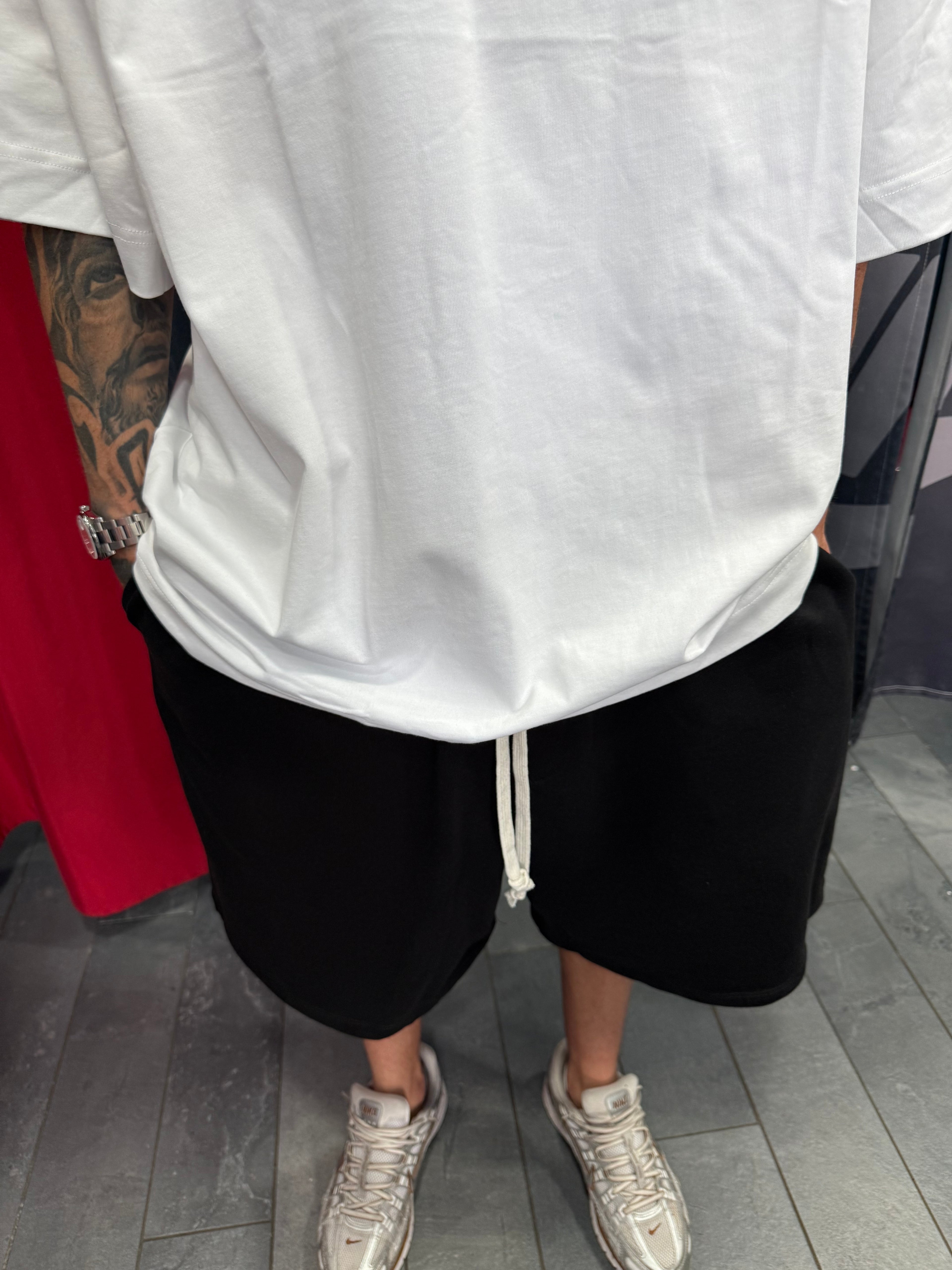 SHORTS TUTA