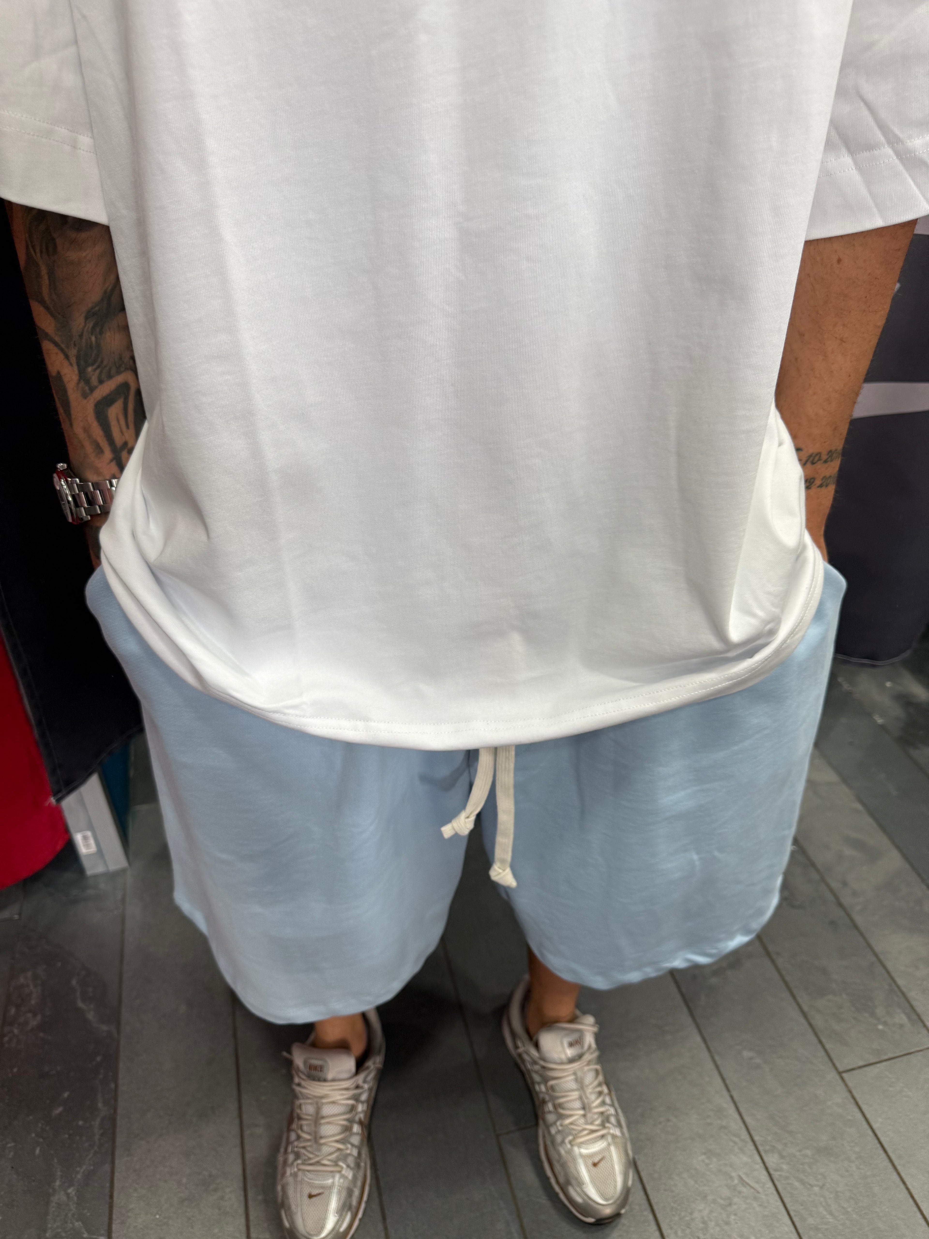 SHORTS TUTA