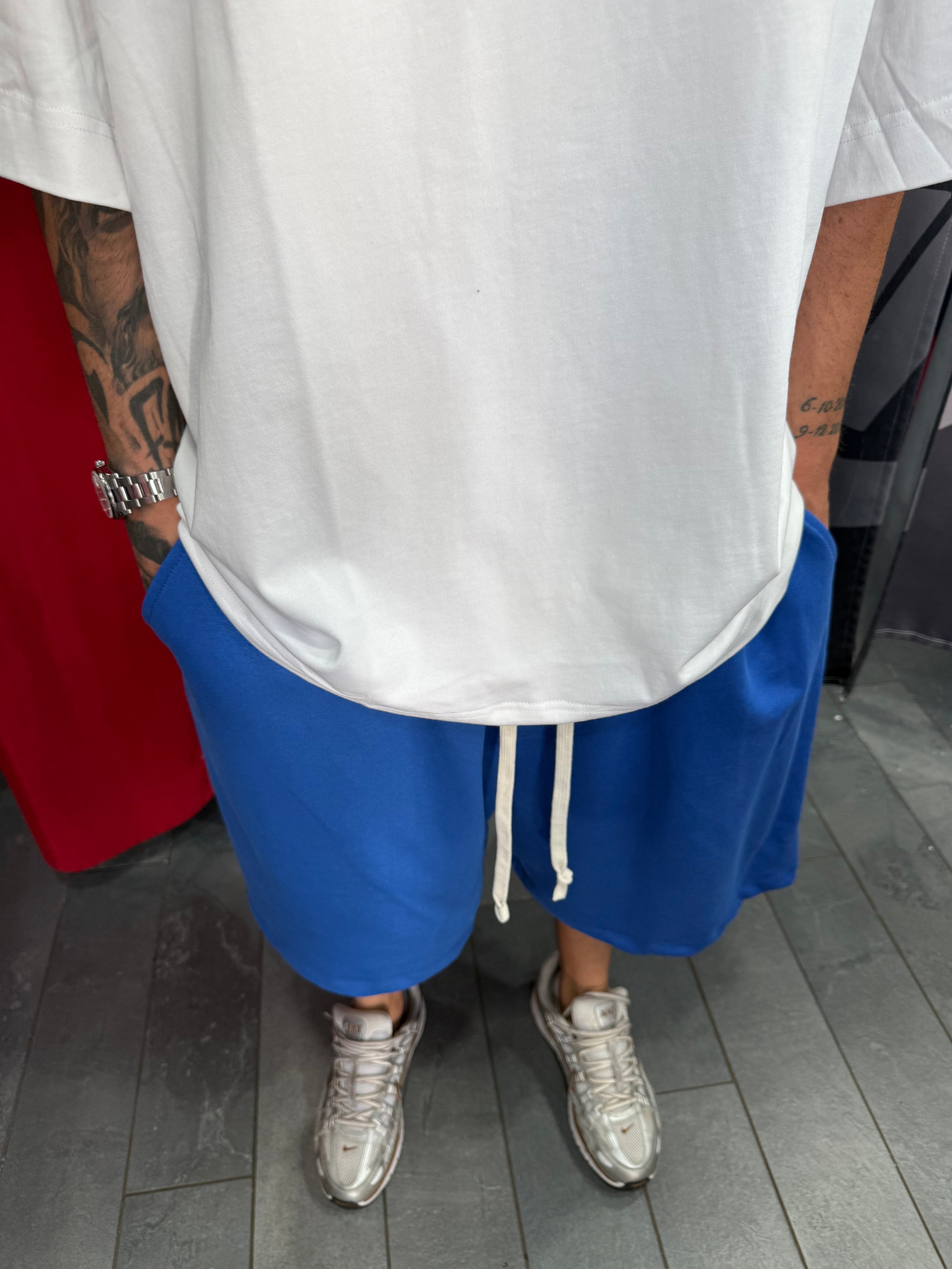 SHORTS TUTA