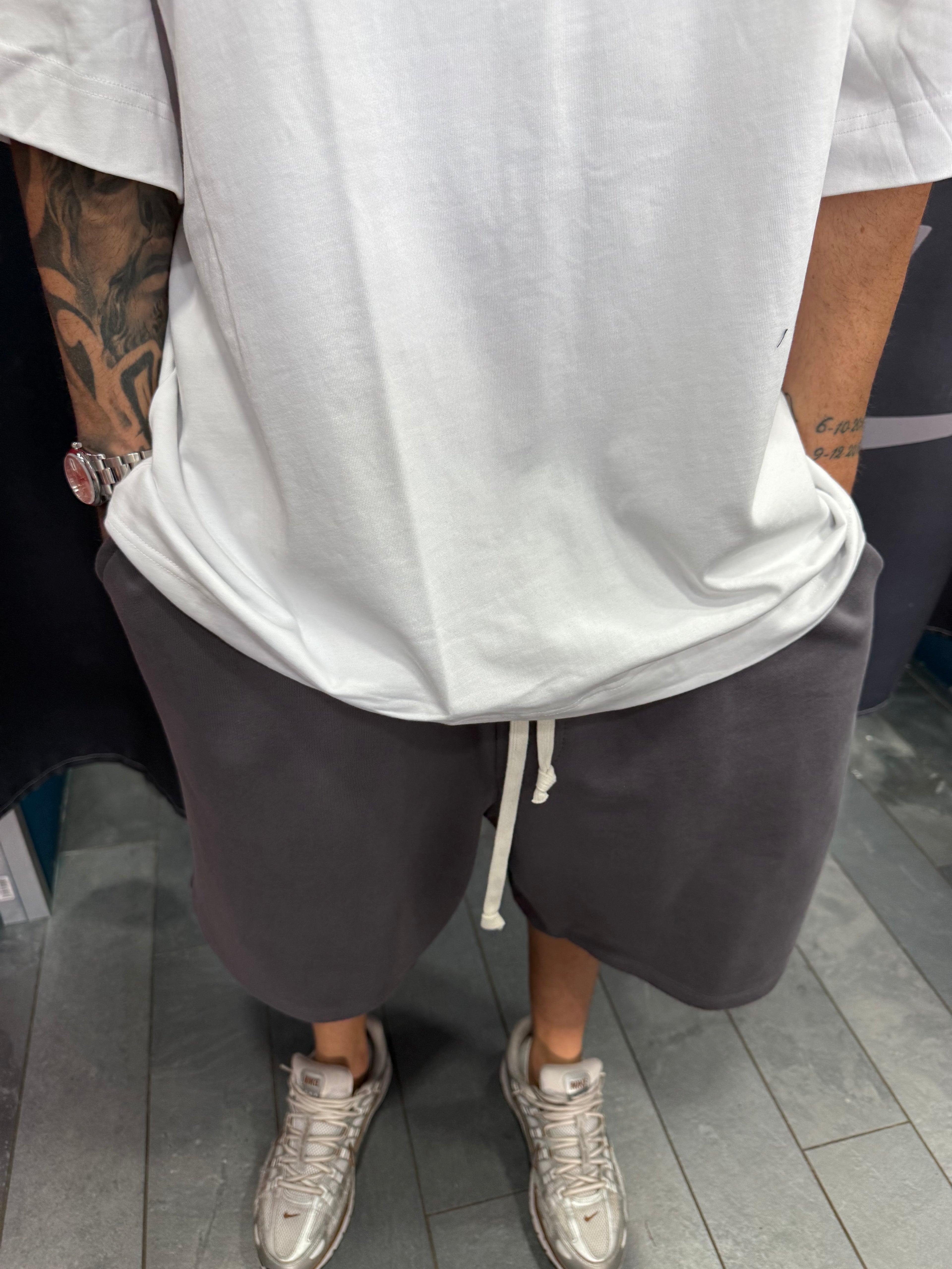 SHORTS TUTA