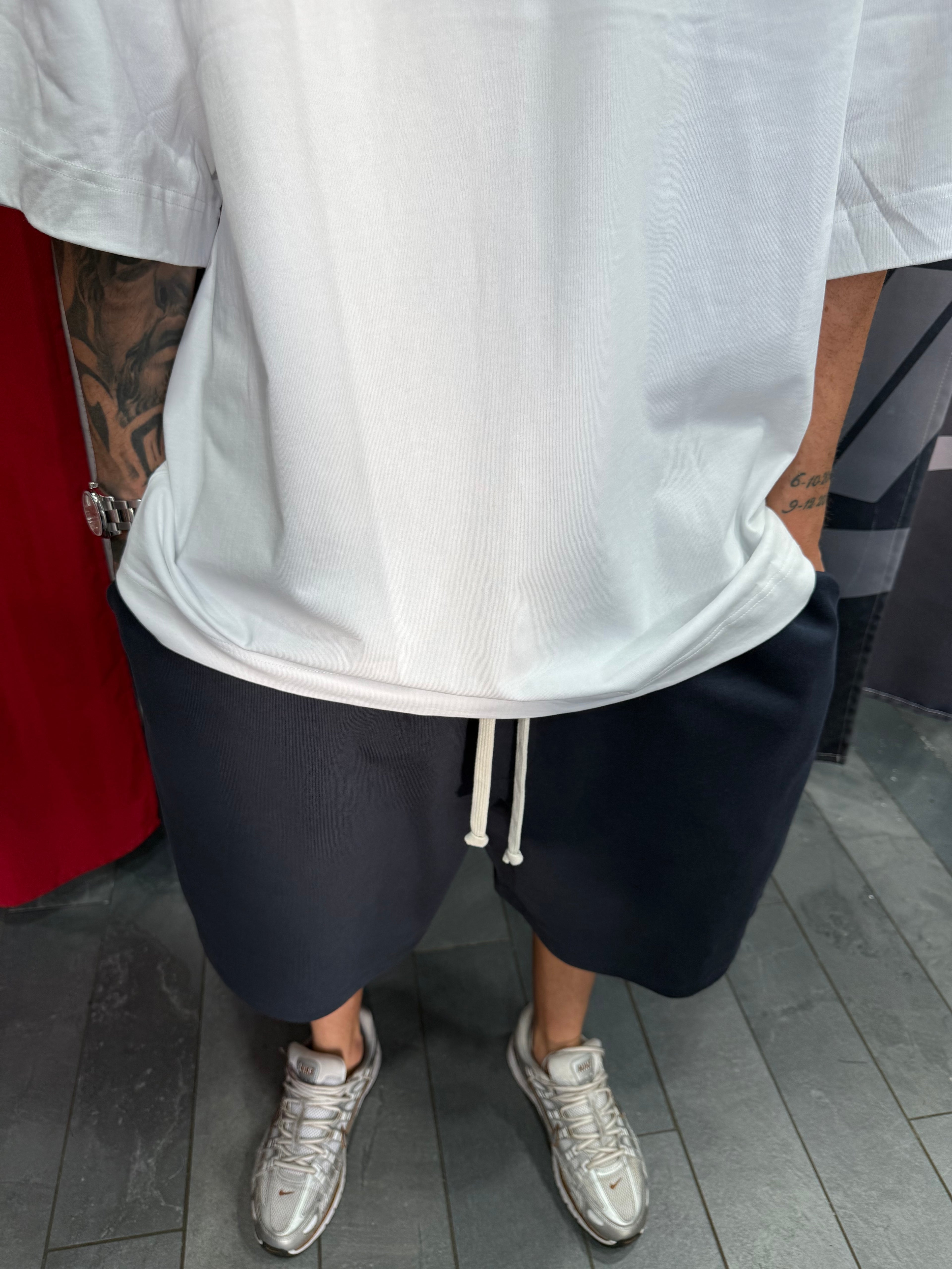 SHORTS TUTA