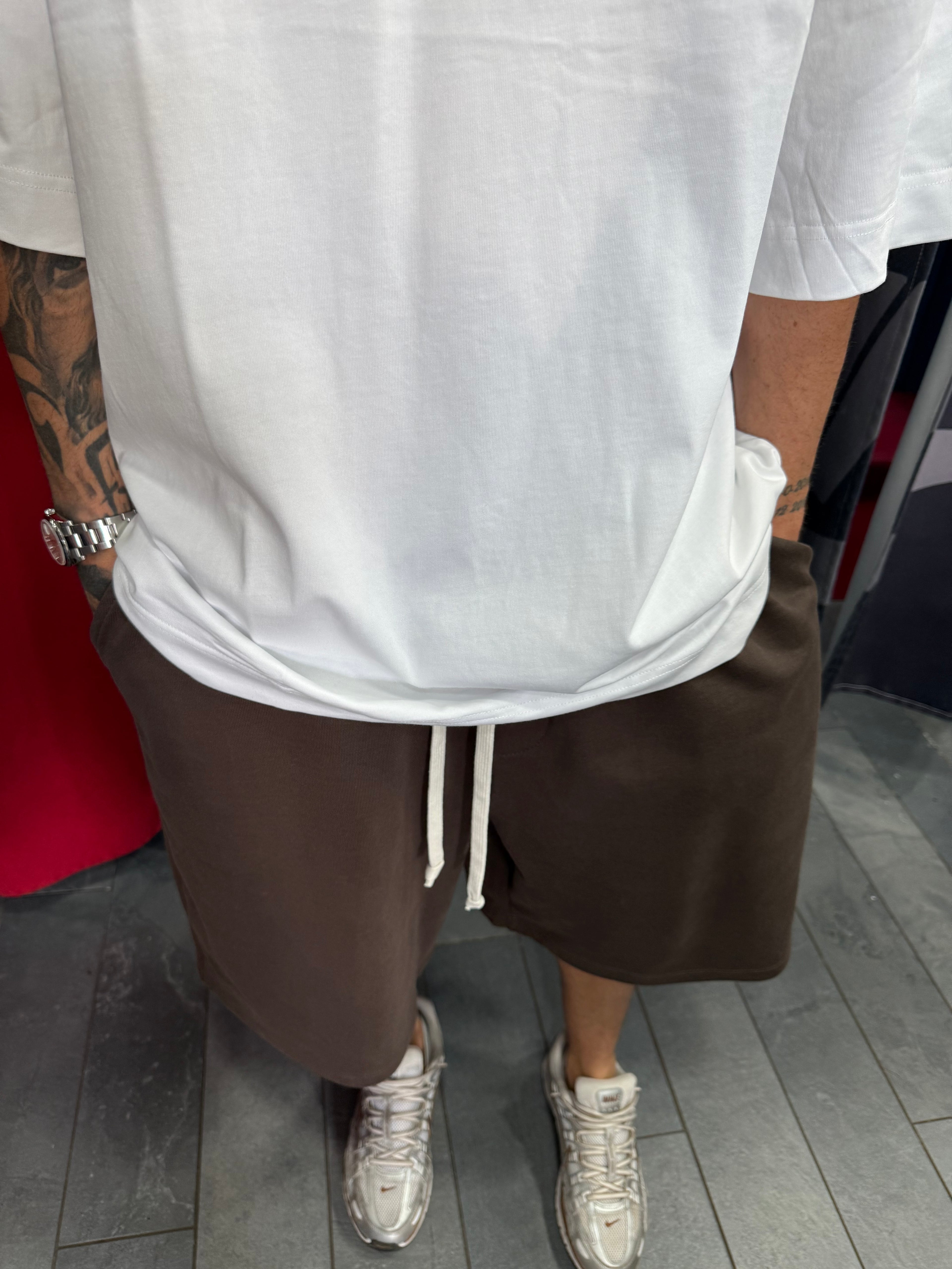SHORTS TUTA