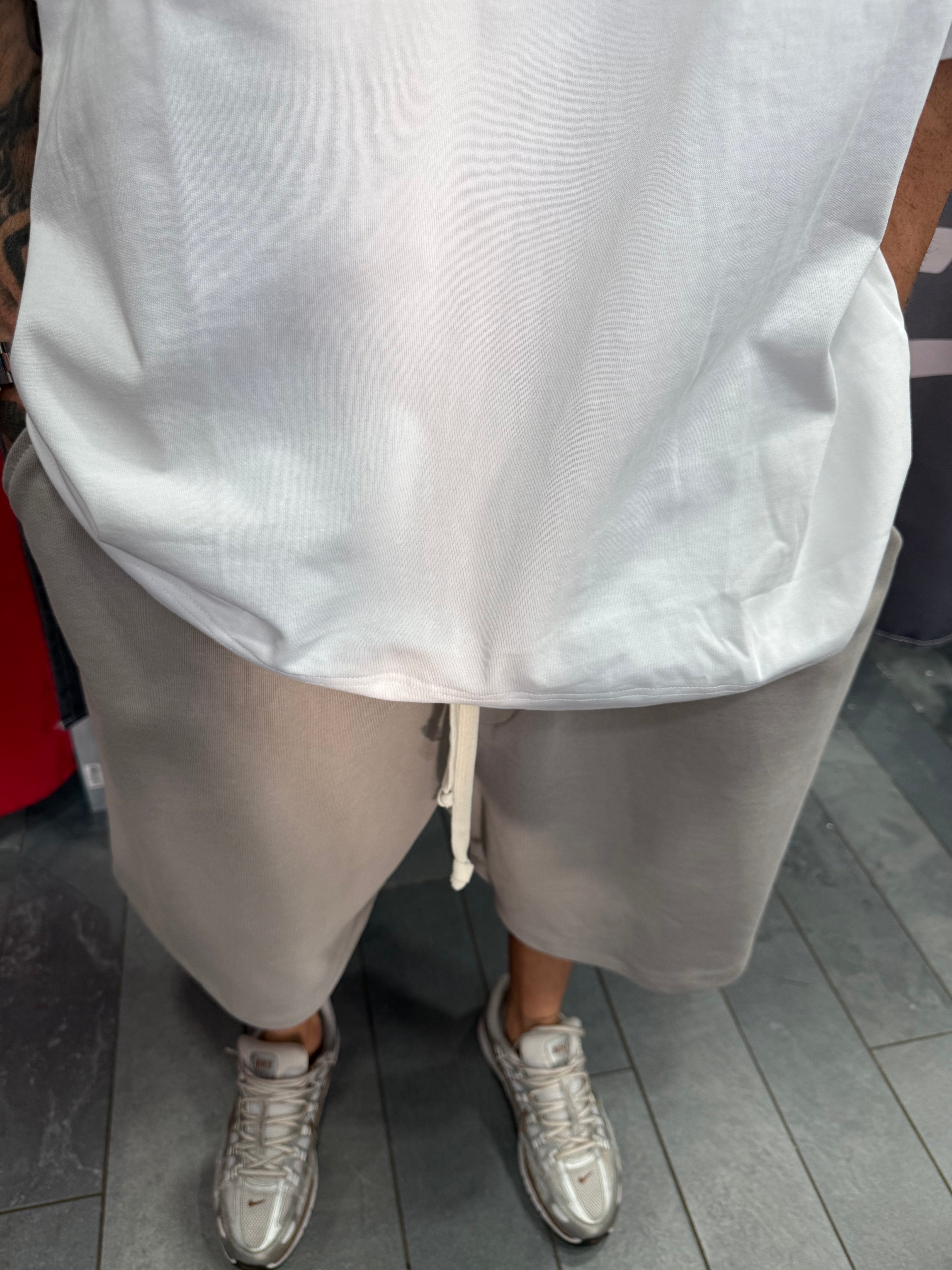 SHORTS TUTA