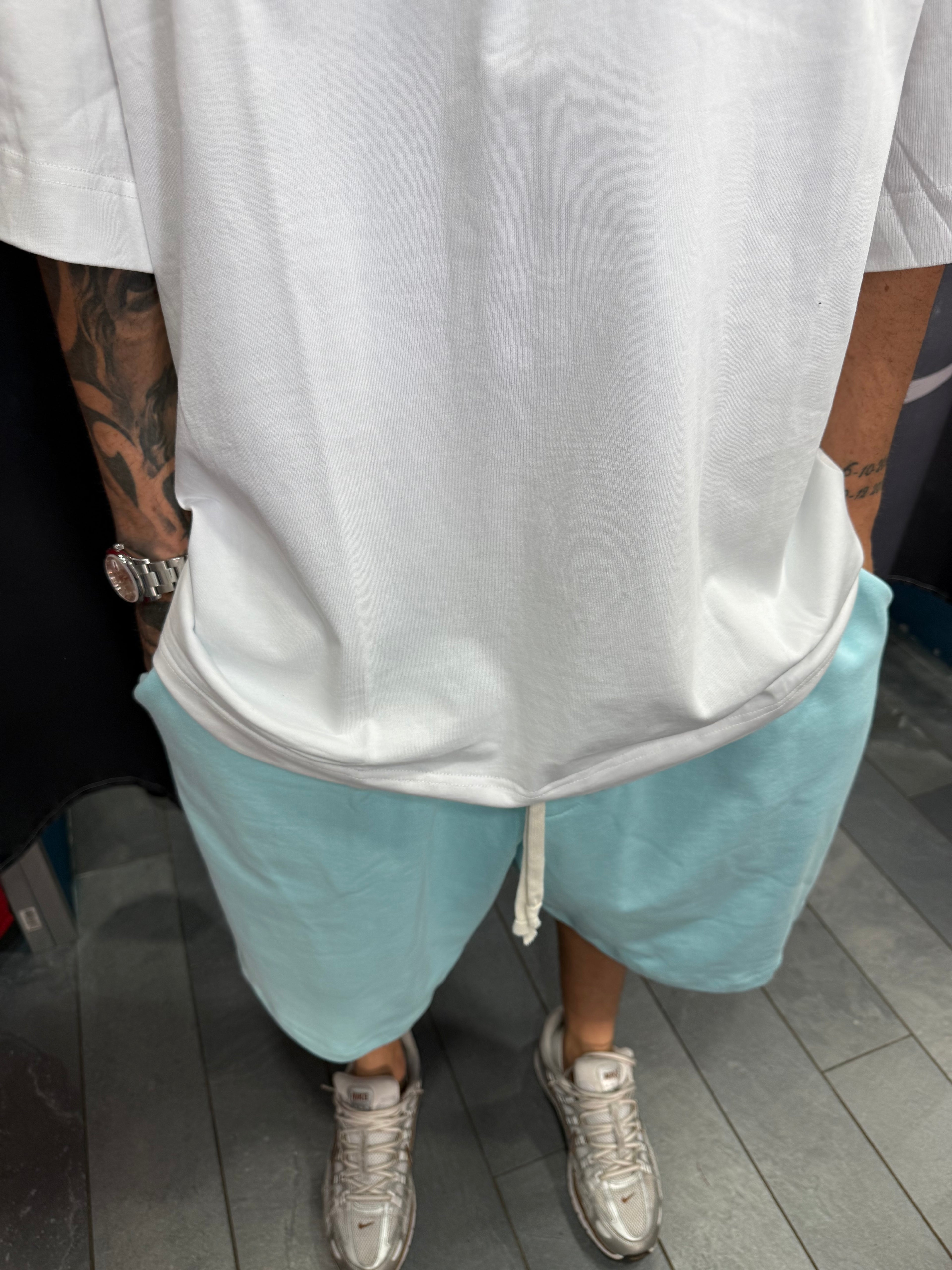 SHORTS TUTA