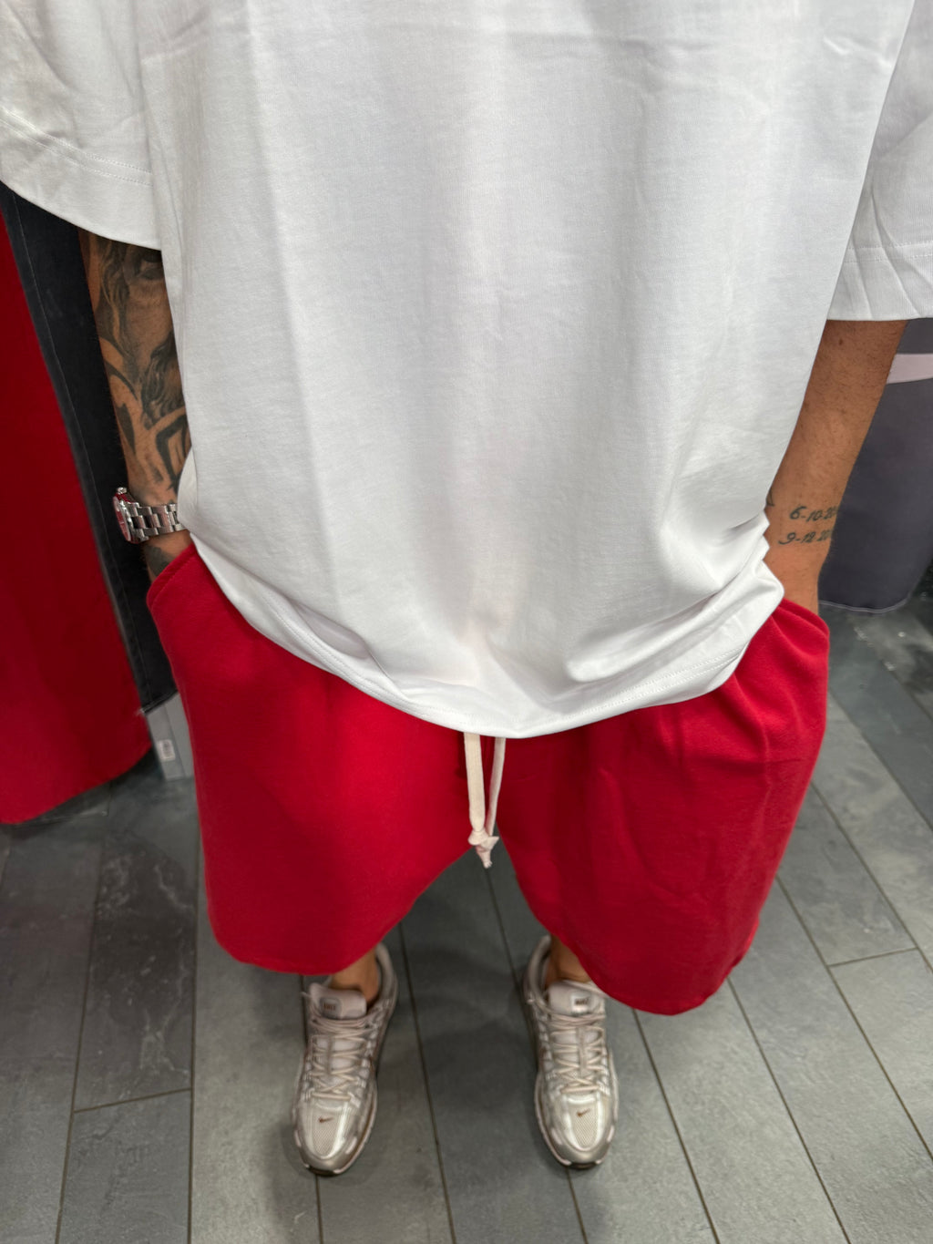 SHORTS TUTA