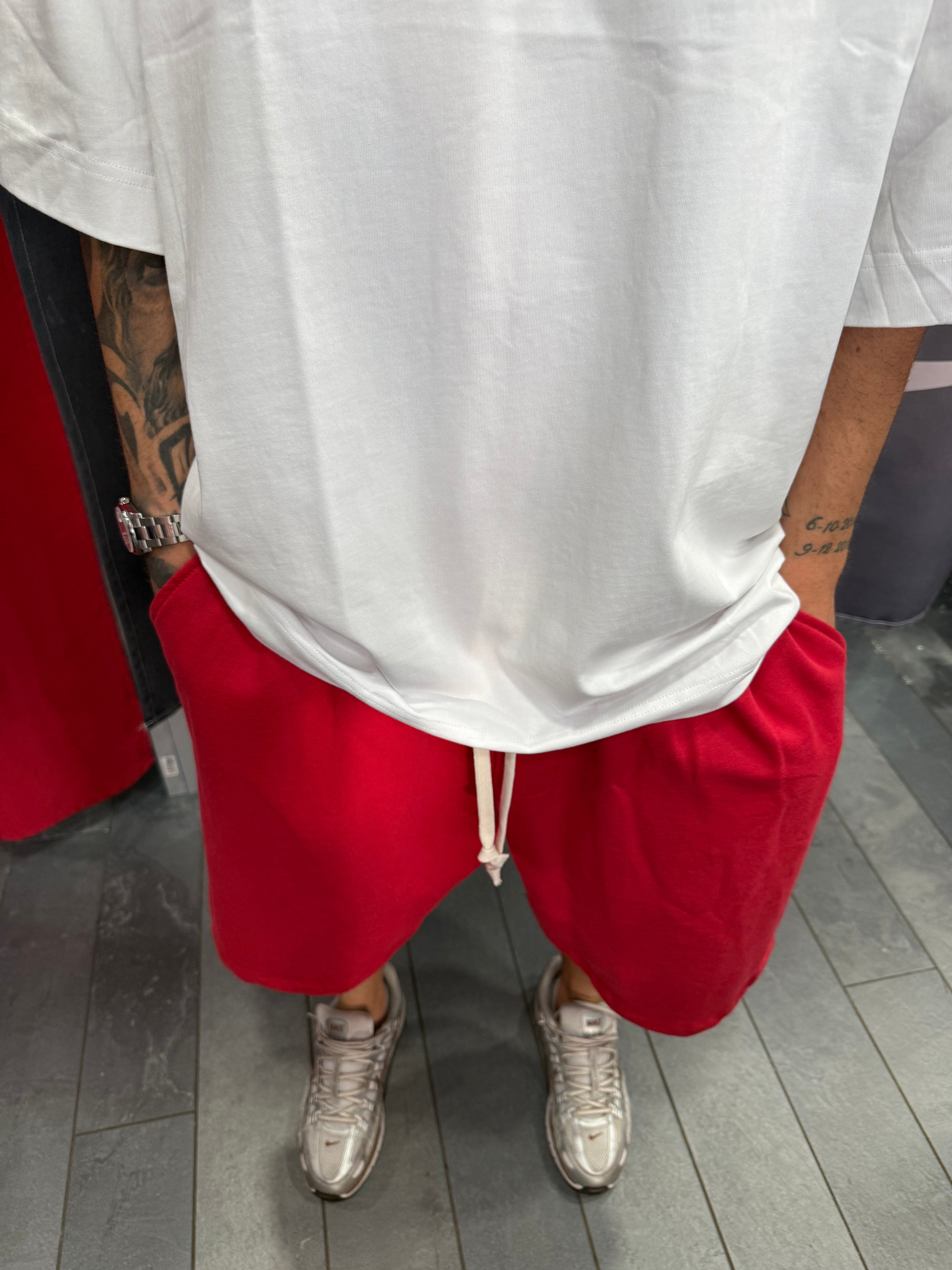SHORTS TUTA